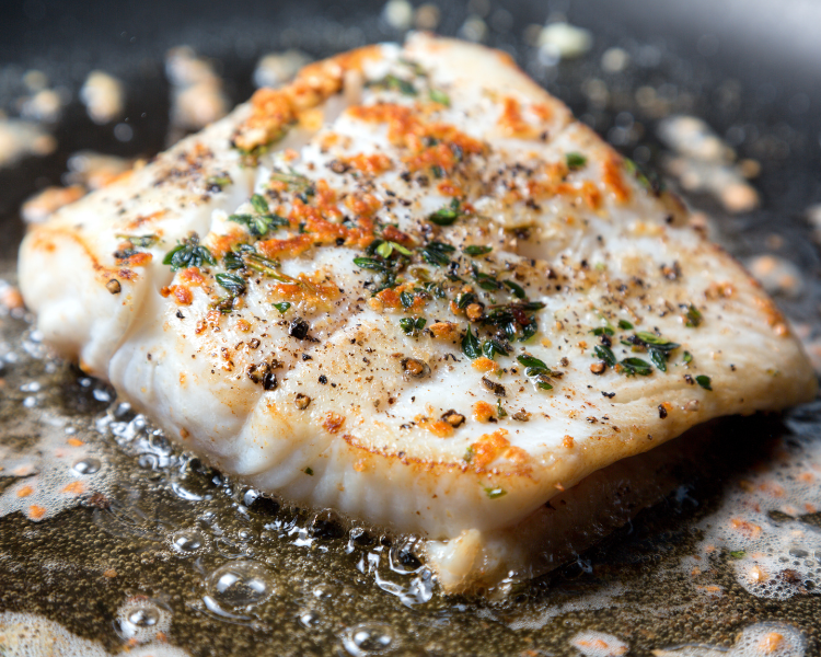 halibut fillet with fresh herbs and butter